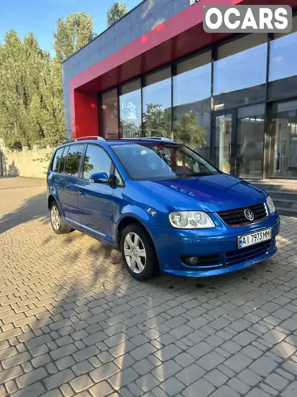 Минивэн Volkswagen Touran 2004 1.6 л. Автомат обл. Киевская, Киев - Фото 1/21