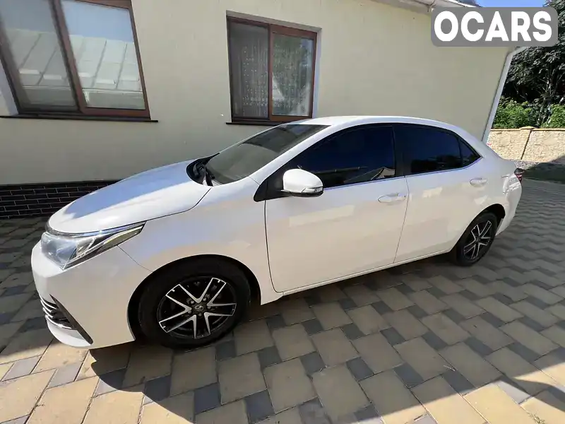 Седан Toyota Corolla 2018 1.6 л. Автомат обл. Винницкая, Винница - Фото 1/13