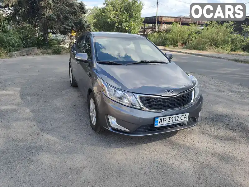 Седан Kia Rio 2012 1.6 л. Ручна / Механіка обл. Запорізька, Запоріжжя - Фото 1/11