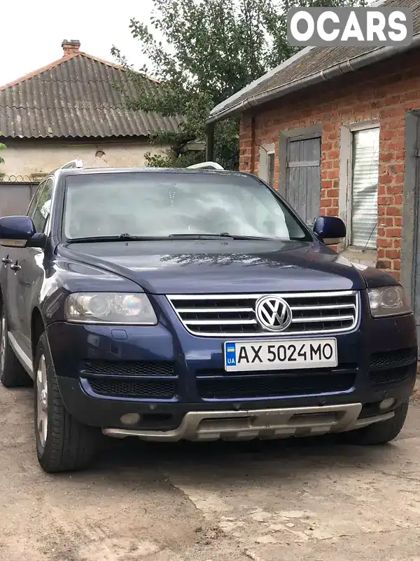 Позашляховик / Кросовер Volkswagen Touareg 2006 3 л. Ручна / Механіка обл. Харківська, Нова Водолага - Фото 1/7