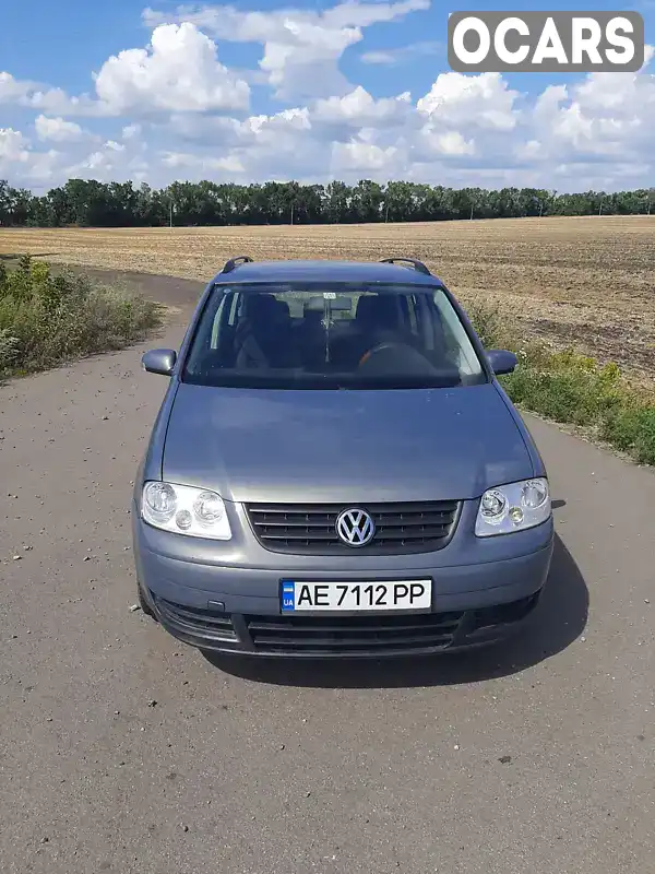 Мінівен Volkswagen Touran 2004 1.6 л. Ручна / Механіка обл. Дніпропетровська, Дніпро (Дніпропетровськ) - Фото 1/10