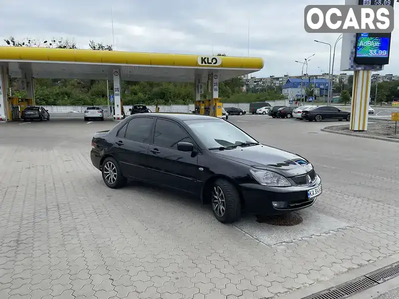 Седан Mitsubishi Lancer 2008 1.58 л. Ручна / Механіка обл. Київська, Київ - Фото 1/21