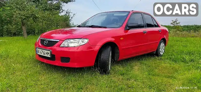 Седан Mazda 323 2002 1.3 л. Ручна / Механіка обл. Рівненська, Рівне - Фото 1/9