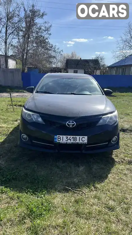 Седан Toyota Camry 2012 2.49 л. Автомат обл. Полтавська, Полтава - Фото 1/11