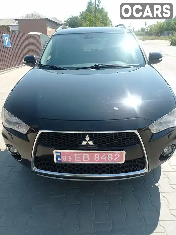 Позашляховик / Кросовер Mitsubishi Outlander XL 2010 2.2 л. Автомат обл. Волинська, Луцьк - Фото 1/18