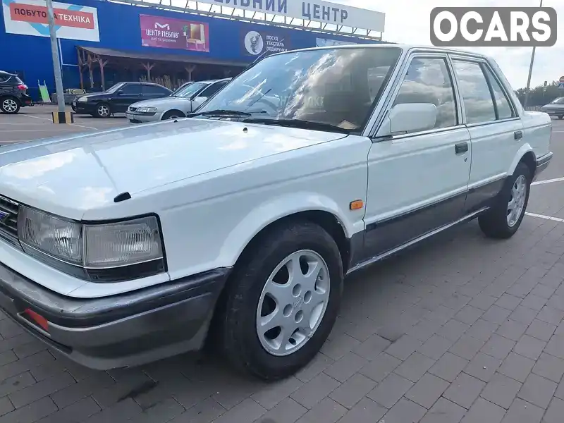 Седан Nissan Bluebird 1988 1.8 л. Ручна / Механіка обл. Чернігівська, Прилуки - Фото 1/19