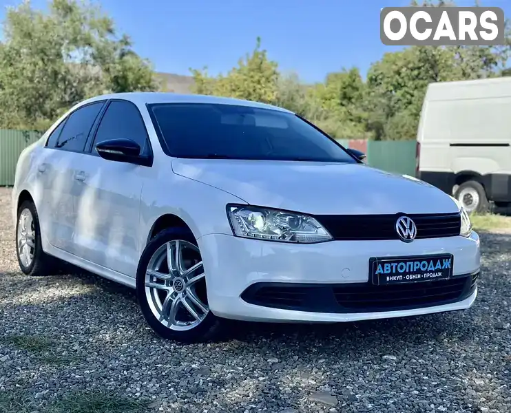 Седан Volkswagen Jetta 2012 1.6 л. Ручна / Механіка обл. Закарпатська, Хуст - Фото 1/21