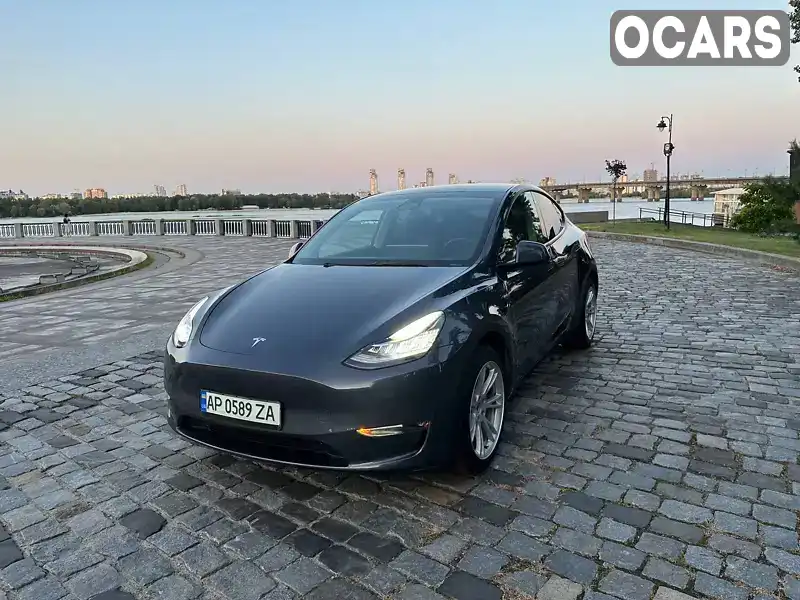 Внедорожник / Кроссовер Tesla Model Y 2023 null_content л. обл. Киевская, Киев - Фото 1/13