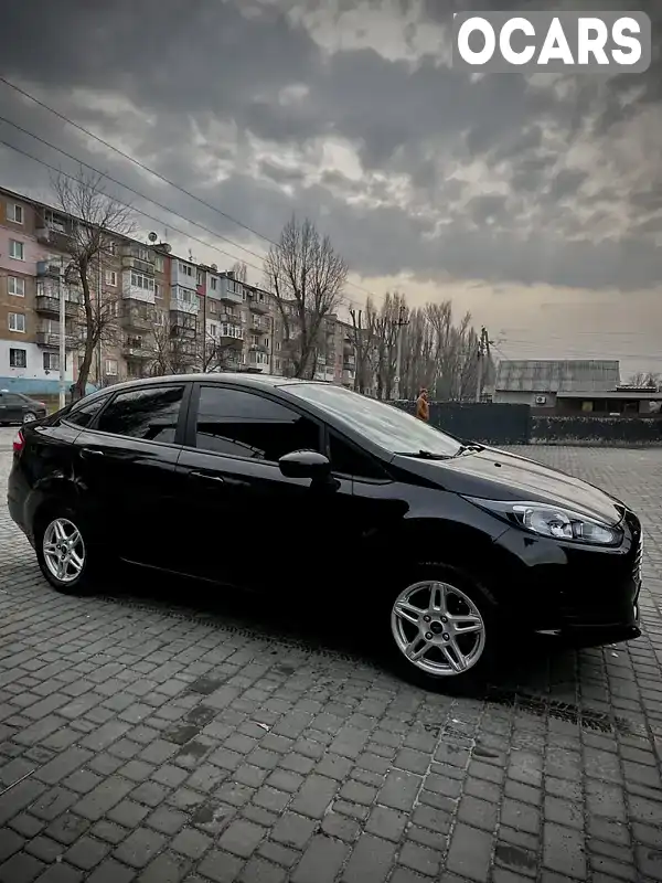 Седан Ford Fiesta 2017 1.6 л. Автомат обл. Днепропетровская, Каменское (Днепродзержинск) - Фото 1/6