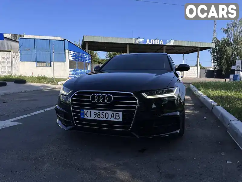 Седан Audi A6 2016 3 л. Автомат обл. Киевская, Вышневое - Фото 1/14