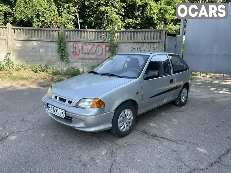 Хетчбек Suzuki Swift 2003 0.99 л. Автомат обл. Київська, Київ - Фото 1/21