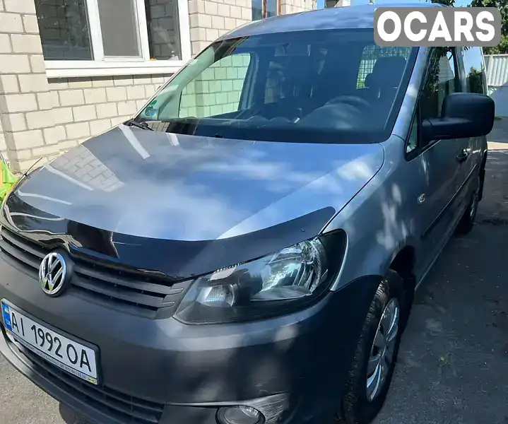 Минивэн Volkswagen Caddy 2014 1.6 л. Ручная / Механика обл. Киевская, Вышневое - Фото 1/16