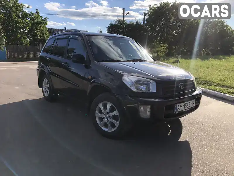 Внедорожник / Кроссовер Toyota RAV4 2003 2 л. Автомат обл. Житомирская, Олевск - Фото 1/11