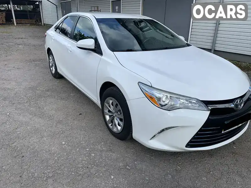 Седан Toyota Camry 2015 2.49 л. Автомат обл. Житомирська, Житомир - Фото 1/20