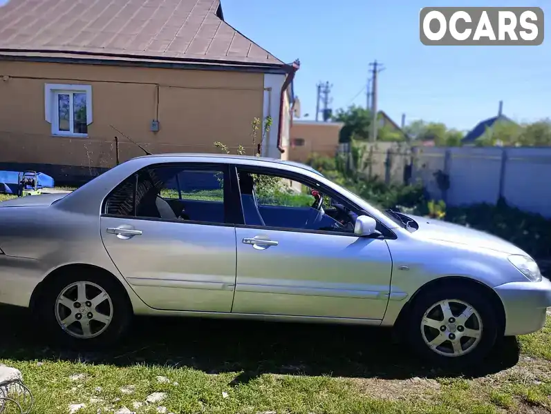 Седан Mitsubishi Lancer 2006 null_content л. Ручная / Механика обл. Киевская, Яготин - Фото 1/12