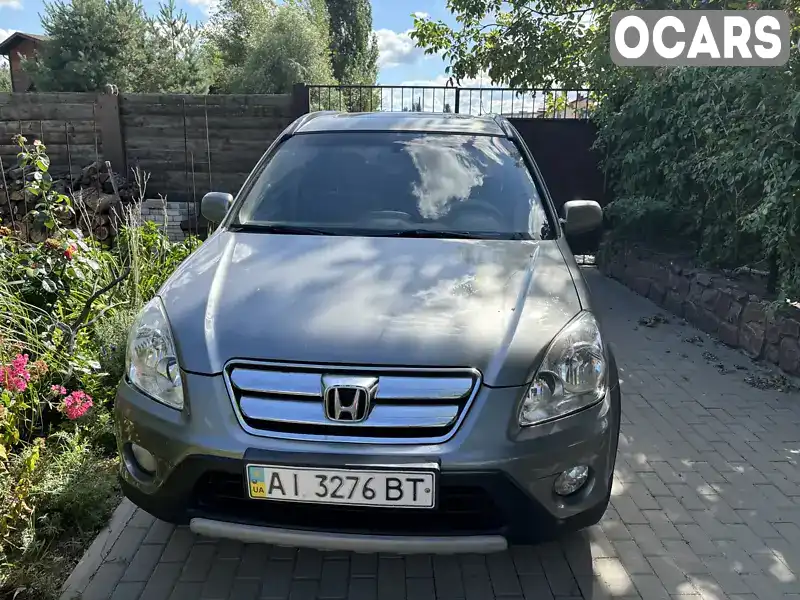 Позашляховик / Кросовер Honda CR-V 2006 2.35 л. Автомат обл. Київська, Обухів - Фото 1/7