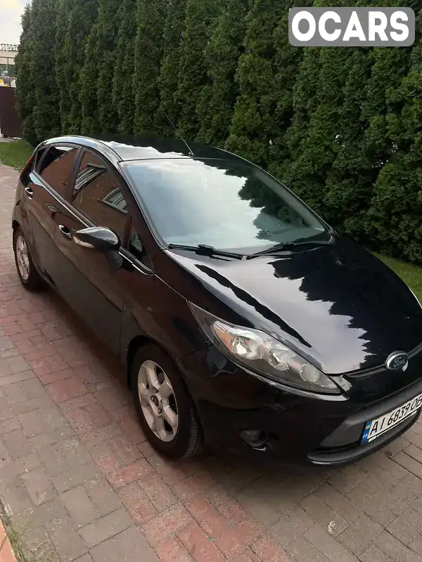 Хетчбек Ford Fiesta 2011 1.39 л. Автомат обл. Київська, Вишневе - Фото 1/22