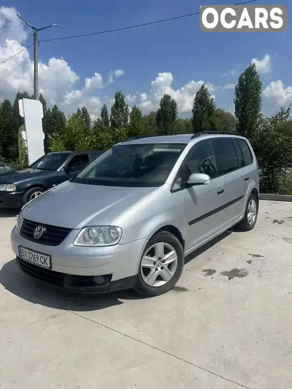 Мінівен Volkswagen Touran 2004 1.9 л. Ручна / Механіка обл. Хмельницька, Кам'янець-Подільський - Фото 1/21