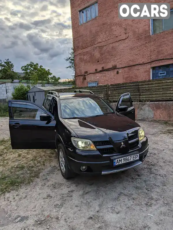 Внедорожник / Кроссовер Mitsubishi Outlander 2007 2.38 л. Автомат обл. Житомирская, Коростень - Фото 1/13