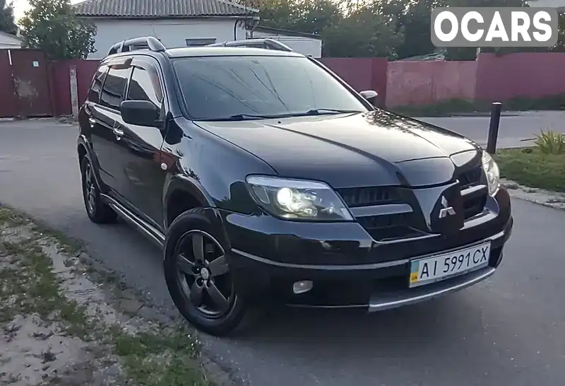 Внедорожник / Кроссовер Mitsubishi Outlander 2006 2.38 л. Типтроник обл. Киевская, Киев - Фото 1/21