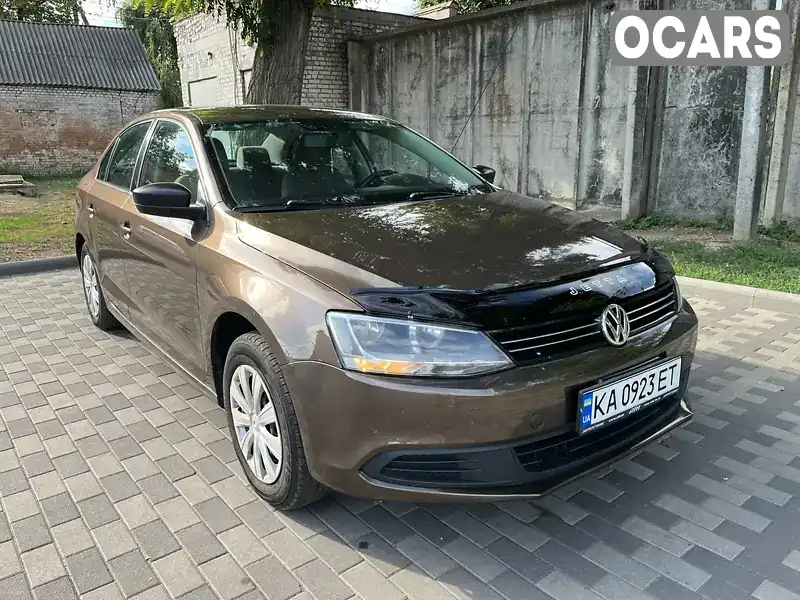 Седан Volkswagen Jetta 2014 1.98 л. Ручна / Механіка обл. Полтавська, Лубни - Фото 1/11