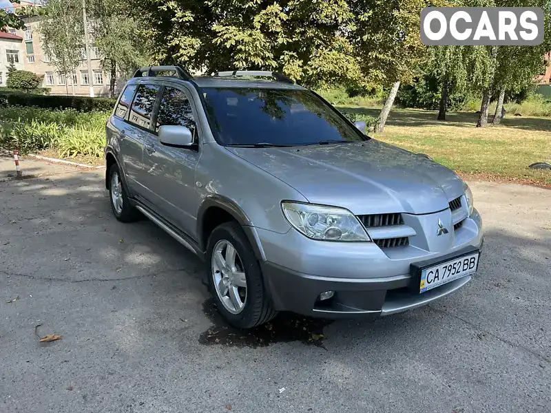 Позашляховик / Кросовер Mitsubishi Outlander 2005 2.38 л. Автомат обл. Черкаська, Золотоноша - Фото 1/10