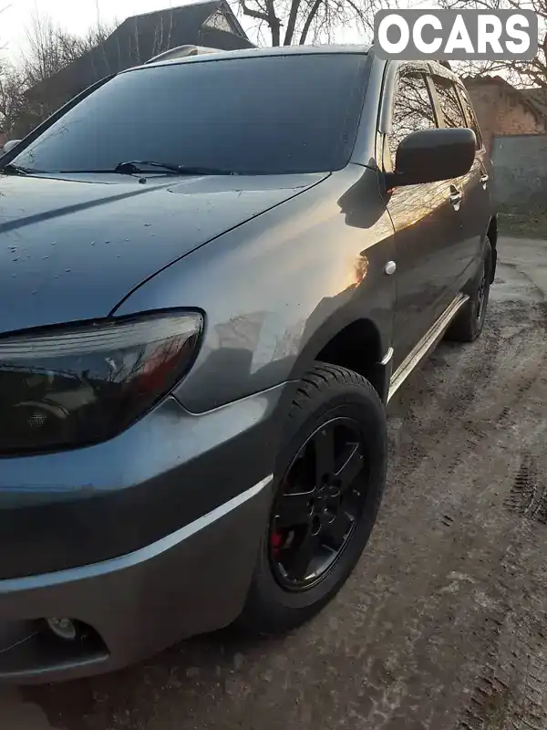 Позашляховик / Кросовер Mitsubishi Outlander 2008 2 л. Ручна / Механіка обл. Сумська, Охтирка - Фото 1/8