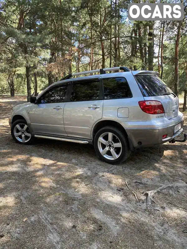 Внедорожник / Кроссовер Mitsubishi Outlander 2009 2 л. Ручная / Механика обл. Полтавская, Кременчуг - Фото 1/17