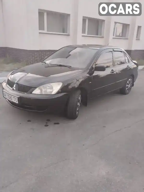 Седан Mitsubishi Lancer 2007 1.6 л. Ручна / Механіка обл. Харківська, Харків - Фото 1/9