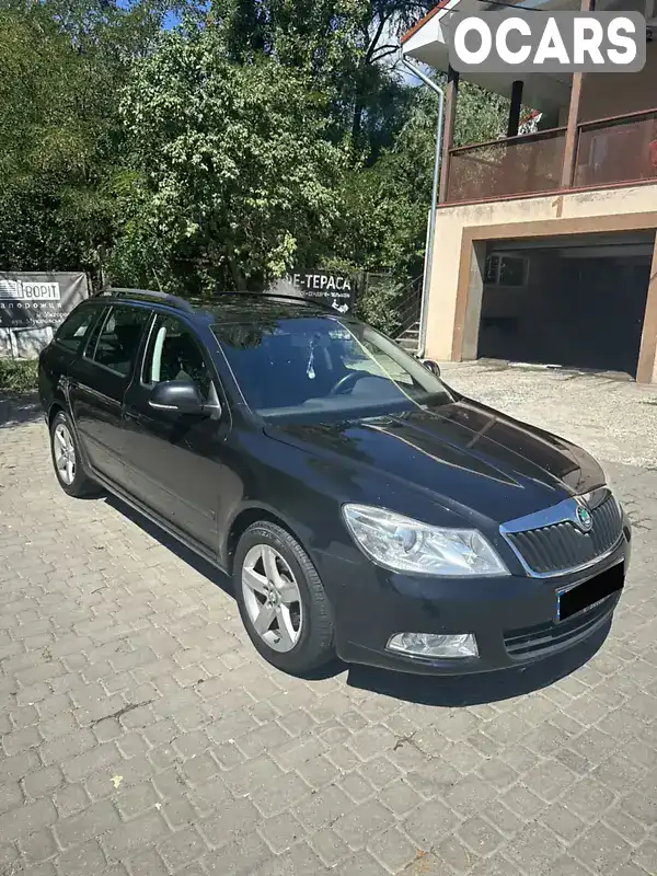 Универсал Skoda Octavia 2011 1.6 л. Ручная / Механика обл. Закарпатская, Ужгород - Фото 1/9