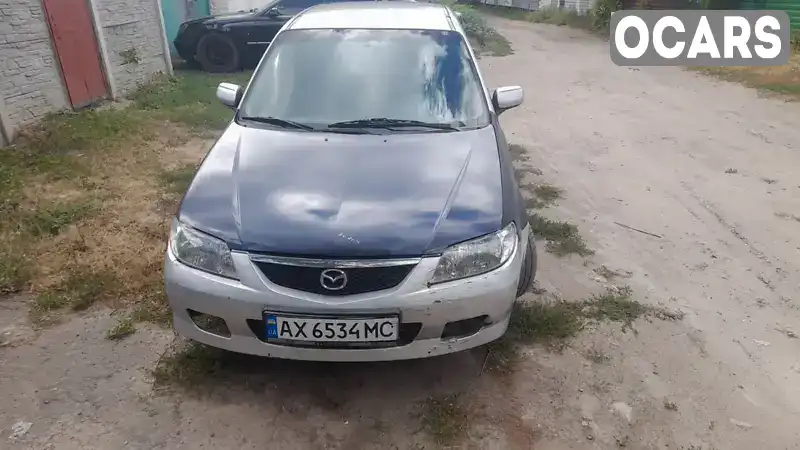 Хэтчбек Mazda 323 2002 1.6 л. Ручная / Механика обл. Харьковская, Харьков - Фото 1/7