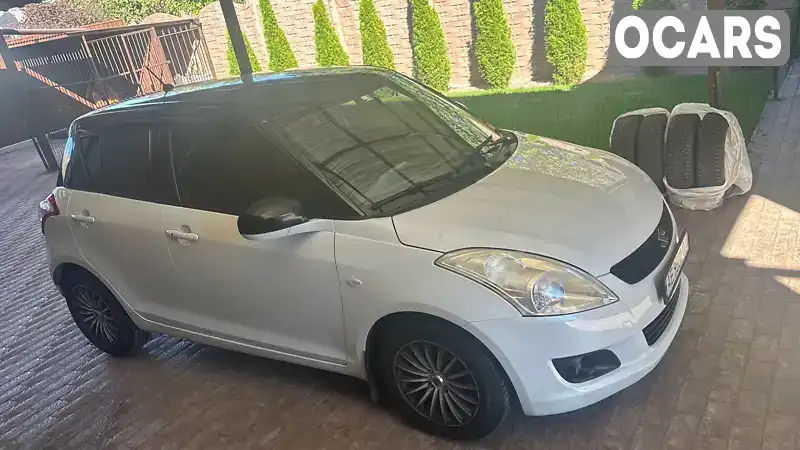 Хетчбек Suzuki Swift 2013 1.24 л. Автомат обл. Дніпропетровська, Кам'янське (Дніпродзержинськ) - Фото 1/14