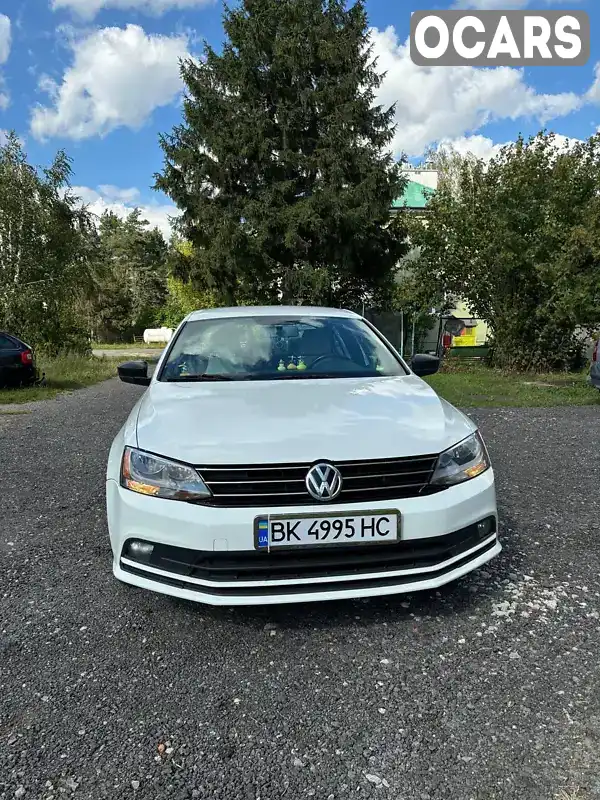 Седан Volkswagen Jetta 2015 1.8 л. Автомат обл. Ровенская, Вараш (Кузнецовск) - Фото 1/11