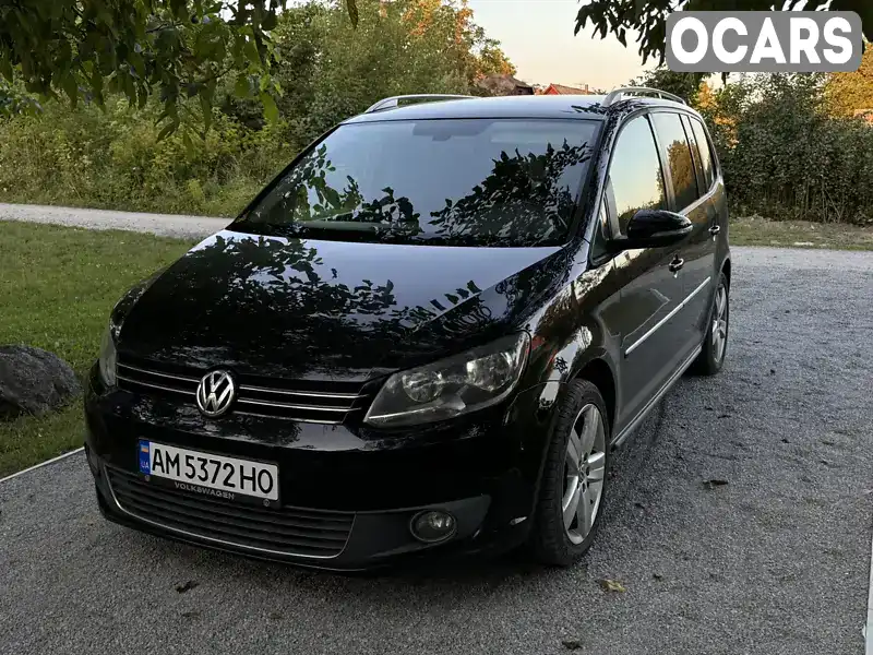 Минивэн Volkswagen Touran 2010 2 л. Автомат обл. Киевская, Вышневое - Фото 1/21