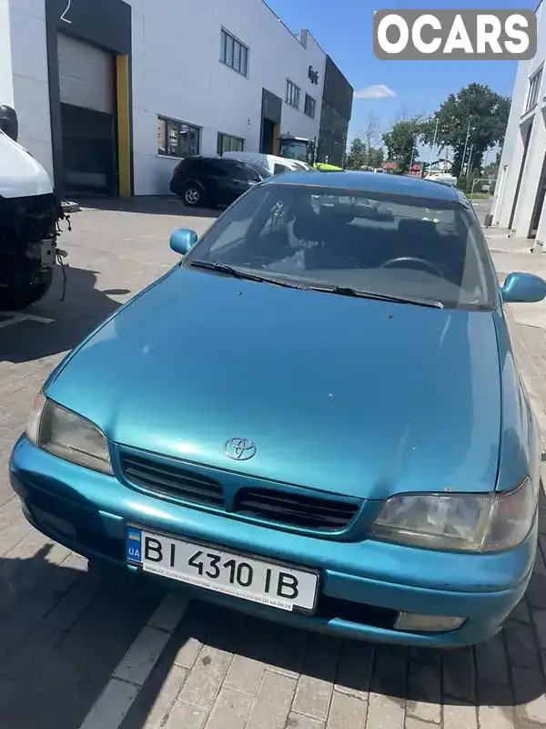 Седан Toyota Carina E 1997 1.8 л. Ручная / Механика обл. Полтавская, Полтава - Фото 1/21