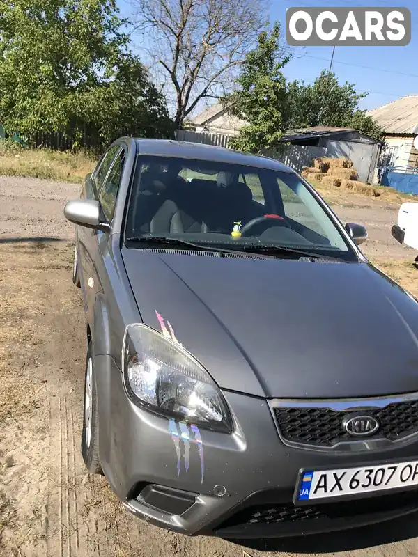 Седан Kia Rio 2011 1.4 л. Ручная / Механика обл. Харьковская, Лозовая - Фото 1/15