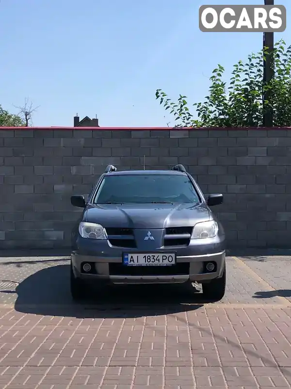 Позашляховик / Кросовер Mitsubishi Outlander 2008 2 л. Ручна / Механіка обл. Київська, Київ - Фото 1/17