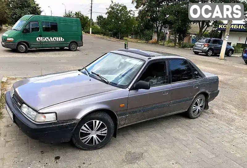 Седан Mazda 626 1991 2 л. Ручная / Механика обл. Херсонская, Белозерка - Фото 1/7