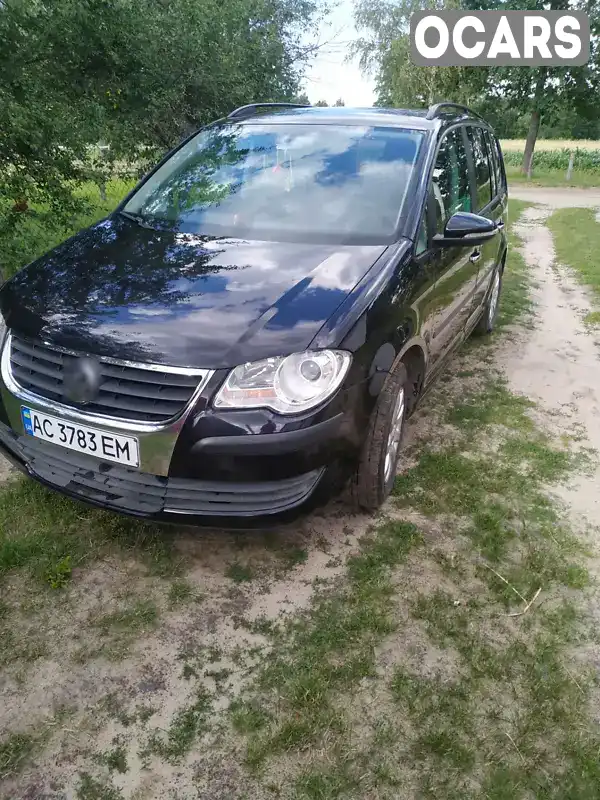 Мінівен Volkswagen Touran 2009 1.9 л. Ручна / Механіка обл. Волинська, Камінь-Каширський - Фото 1/3