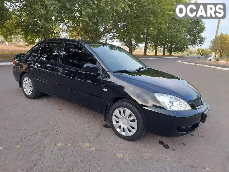 Седан Mitsubishi Lancer 2007 1.6 л. Ручная / Механика обл. Николаевская, Вознесенск - Фото 1/21