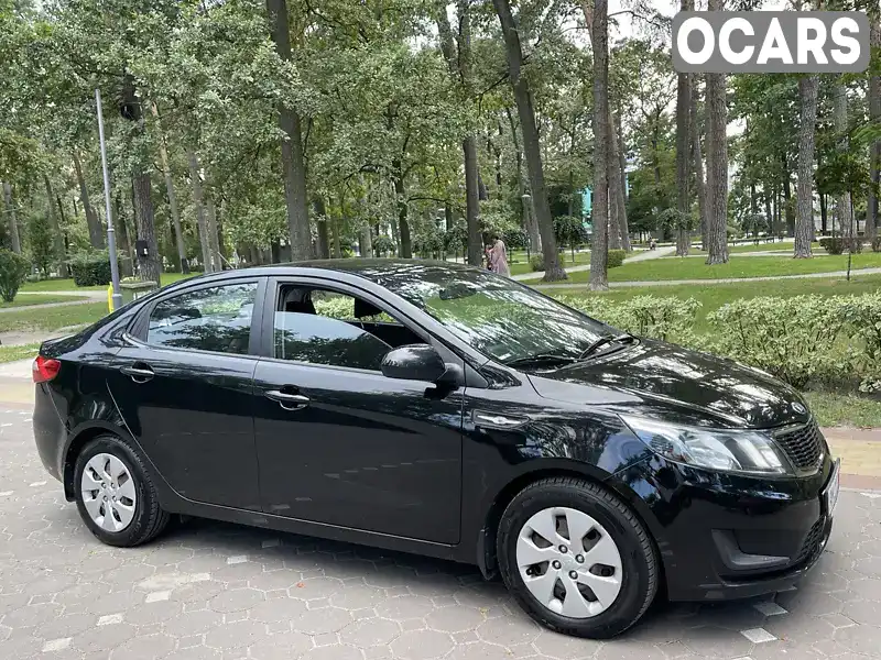 Хетчбек Kia Rio 2013 1.4 л. Автомат обл. Київська, Ірпінь - Фото 1/9