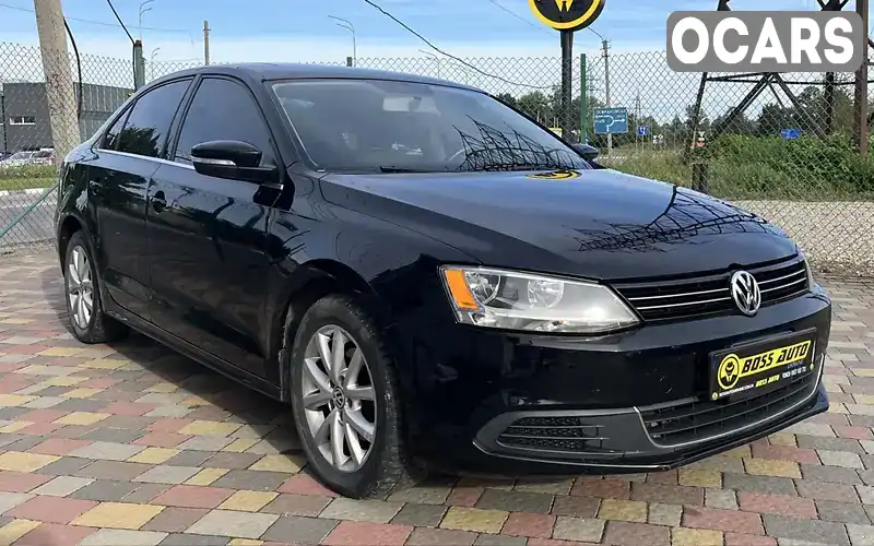 Седан Volkswagen Jetta 2012 2.48 л. Автомат обл. Львовская, Стрый - Фото 1/21