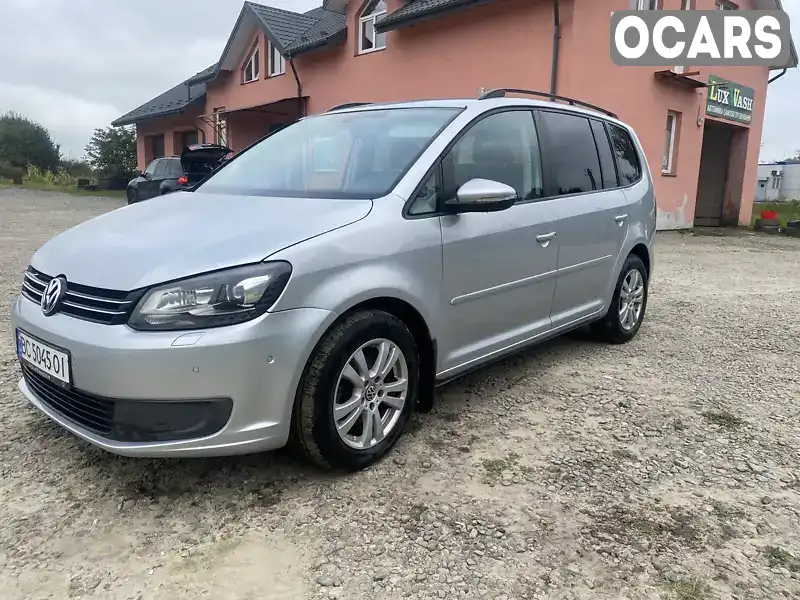 Мінівен Volkswagen Touran 2011 2 л. Автомат обл. Львівська, location.city.komarno - Фото 1/21