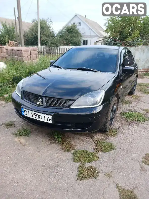 Седан Mitsubishi Lancer 2006 1.59 л. Автомат обл. Житомирська, Черняхів - Фото 1/15