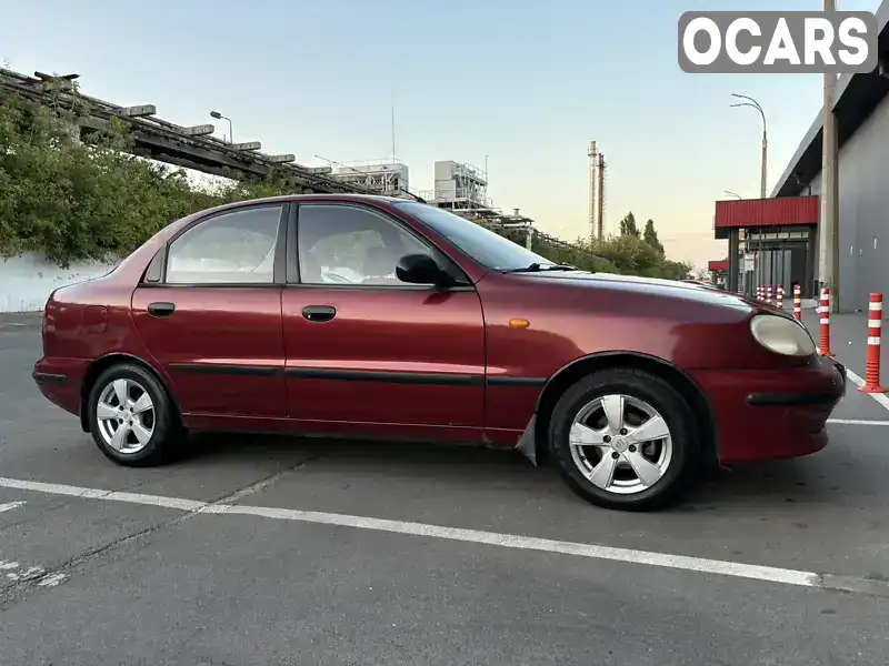 Седан Daewoo Lanos 2004 1.5 л. Ручная / Механика обл. Киевская, Вышневое - Фото 1/21