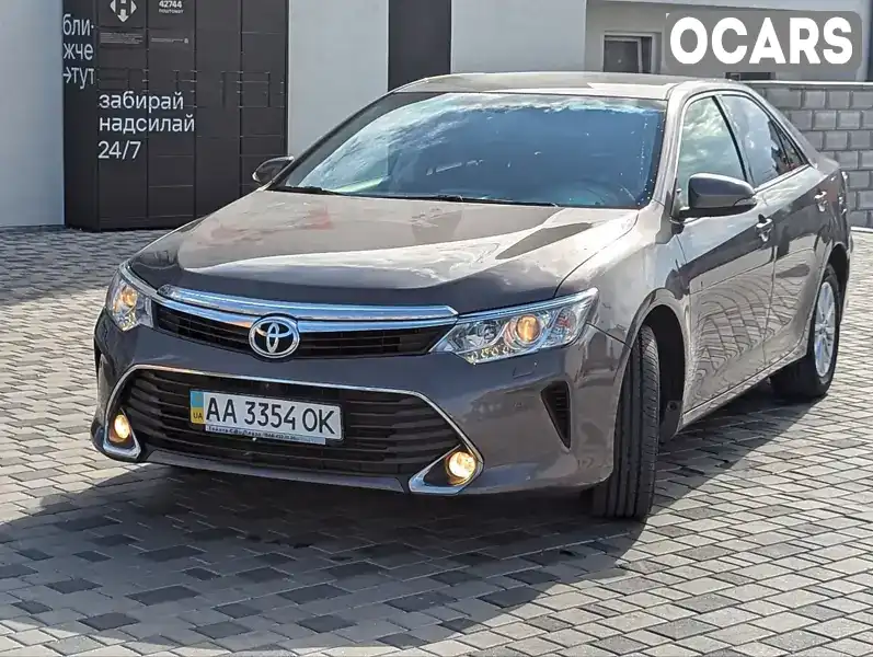 Седан Toyota Camry 2014 2.49 л. Автомат обл. Ровенская, Корец - Фото 1/21