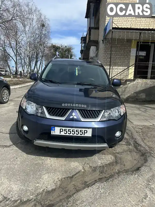 Внедорожник / Кроссовер Mitsubishi Outlander XL 2009 2.4 л. Вариатор обл. Харьковская, Новая Водолага - Фото 1/7