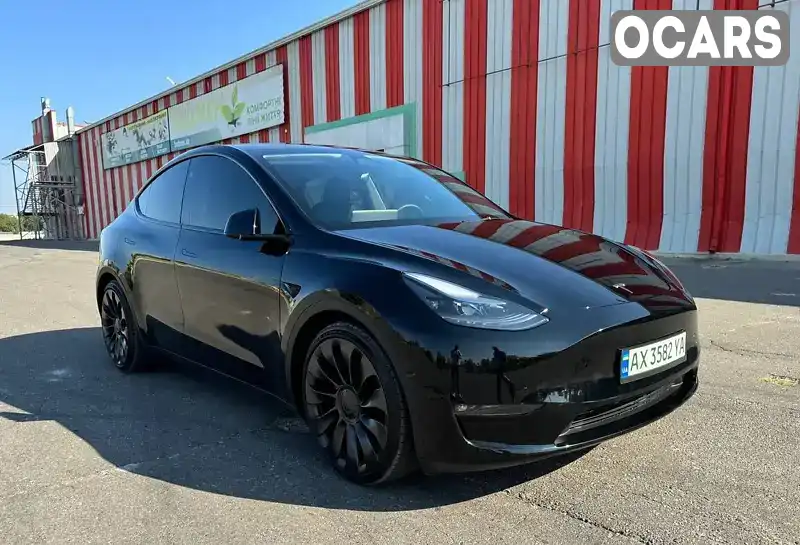 Внедорожник / Кроссовер Tesla Model Y 2023 null_content л. обл. Харьковская, Харьков - Фото 1/21