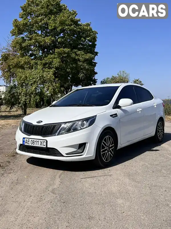 Седан Kia Rio 2013 1.4 л. Автомат обл. Дніпропетровська, Дніпро (Дніпропетровськ) - Фото 1/9