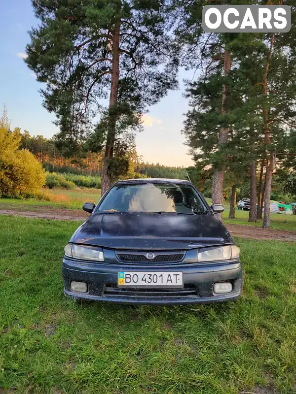 Седан Mazda 323 1997 1.5 л. Ручна / Механіка обл. Рівненська, Дубно - Фото 1/21